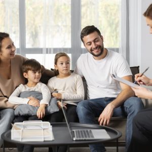 close-up-smiley-family-therapist (1)